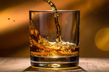 Een dure slok op een borrel