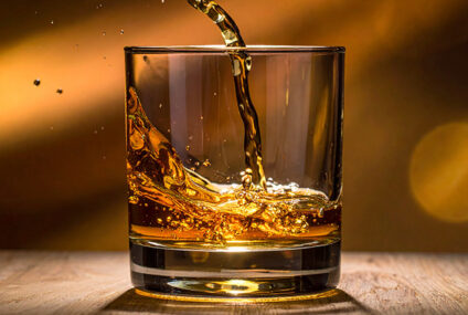 Een dure slok op een borrel